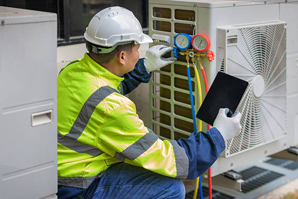 Professional Heat Pump Repair technician working in Bogota, NJ
